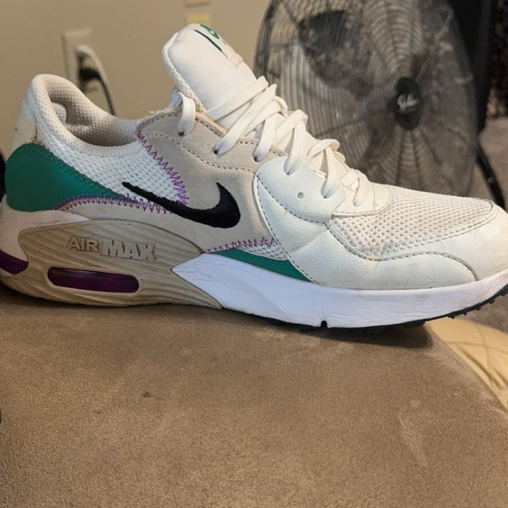 White Nikes with kelley green and a hint of purple